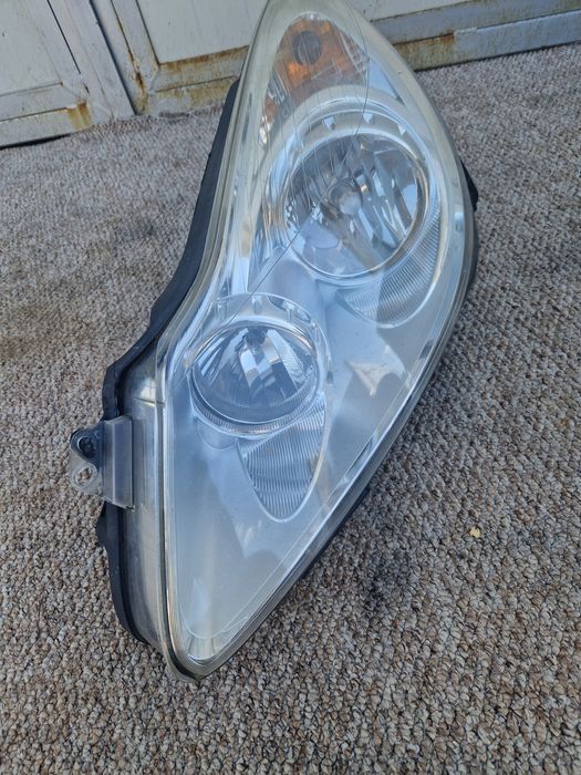 Far stanga Opel Corsa D 2008 cu halogen