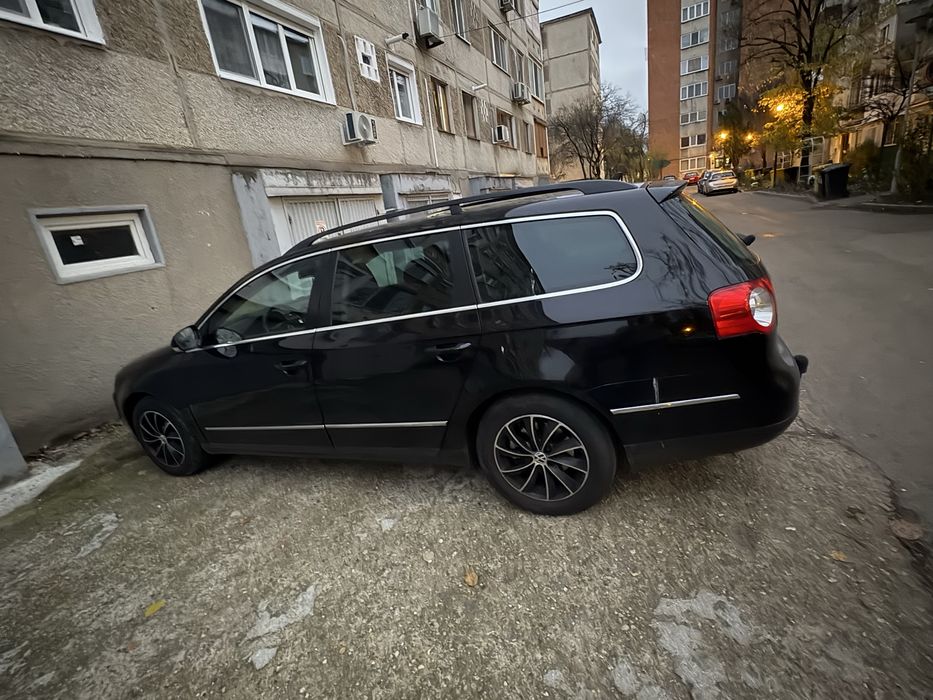 Passat b6 combi negru an2009 pret in euro