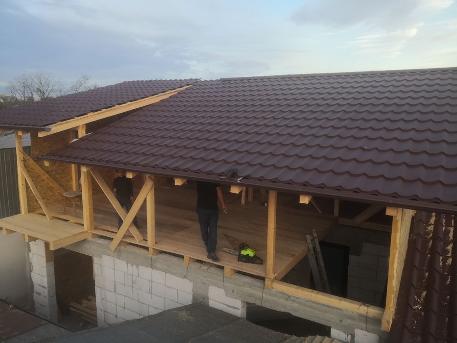 Reparatii acoperis montaj tigla metalica mansarde construcții