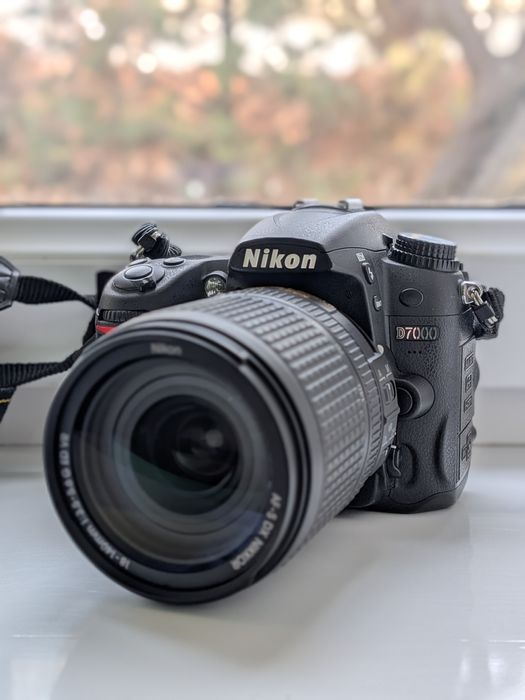 Nikon d7000 с объективом 18-140mm пробег 22000 кадров