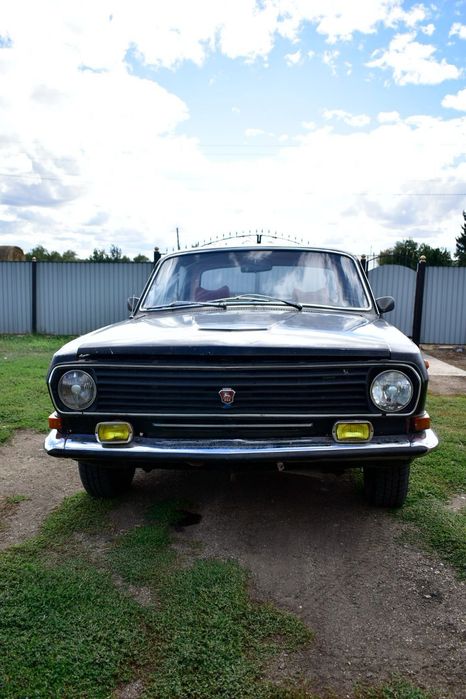 Автомобиль газ 2411