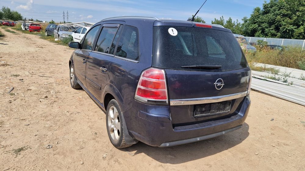 Opel zafira motor cutie faruri capota bara aripa aripi far usi usa portbagaj hayon oglinda scaune interior armatura volan stop stopuri roti jante