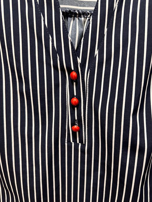 Cămașa cu mânecă 3 sferturi