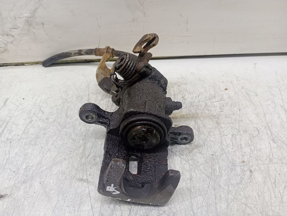 Etrier dreapta spate Hyundai Coupe GK (2001 - 2005) 1.6 BENZINA G4KD