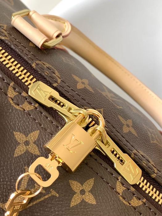 Сумка Keepall 45 cm с плечевым ремнем Louis Vuitton