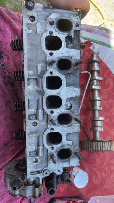 Chiulasă completă VW Passat B6 2.0 TDI BMP + ax cu came + injectoare + pompă vacuum/tandem