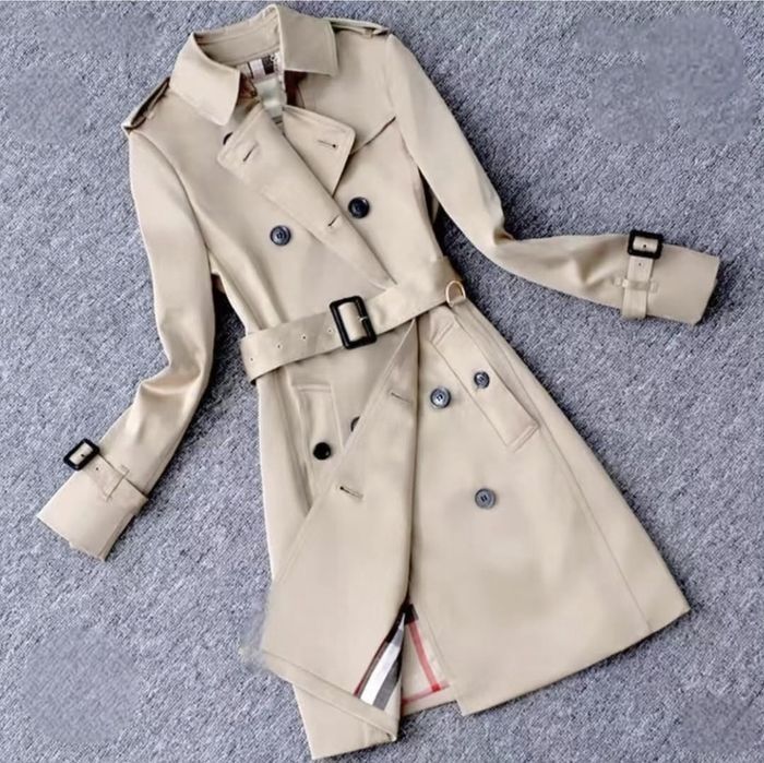 Продам тренч новый..