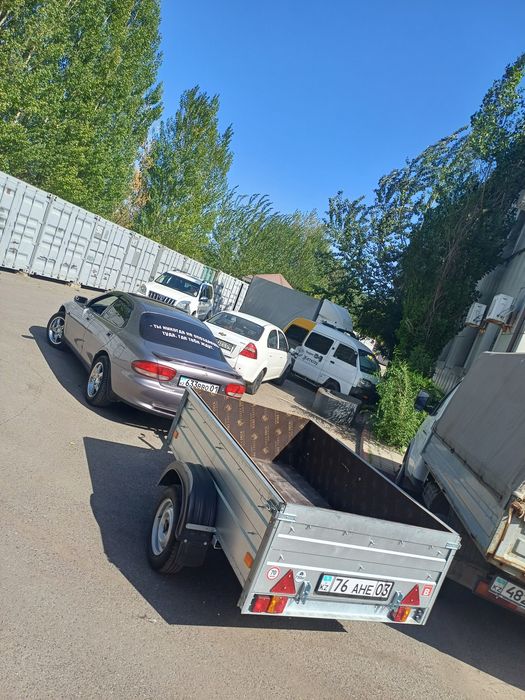 Продам мазду с прицепом.
