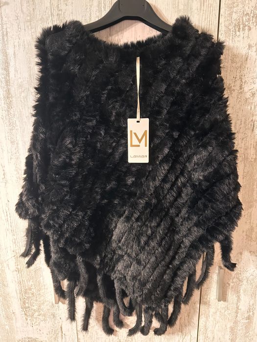 Дамски елеци и пончота намалени