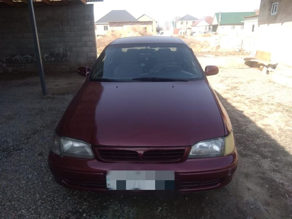 Тойота Карина Е-