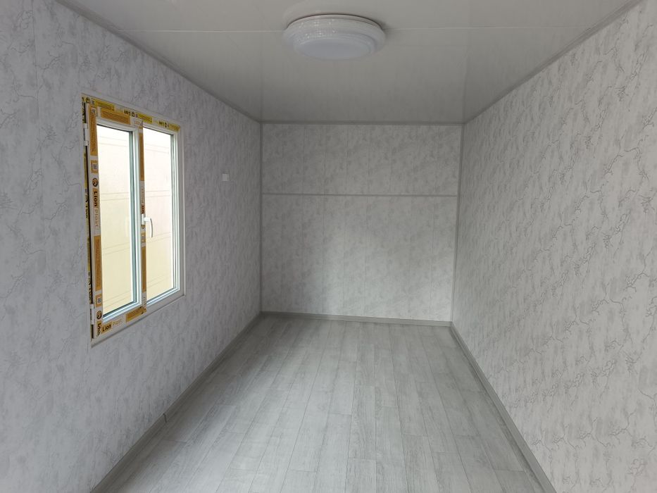 Domik qilingan konteyner.