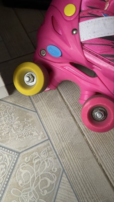 Роликовые конький