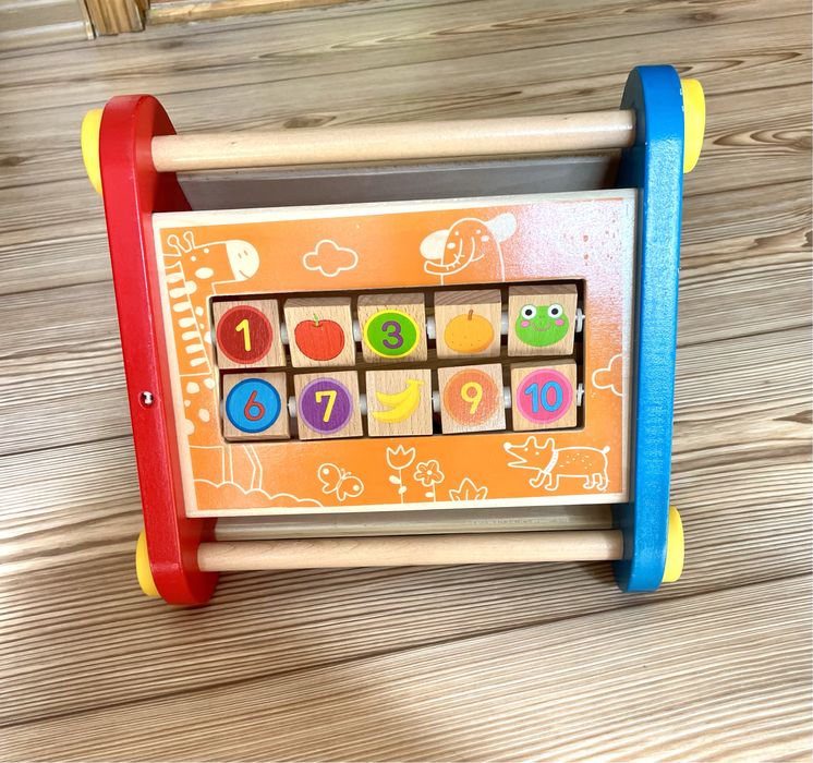 Развивающая игрушка треугольник