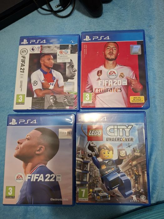 Pachet Complet PS4 Slim (Stare Perfectă) + 3 Manete Originale + 7 Jocuri (FC 25, Lego, Injustice)
