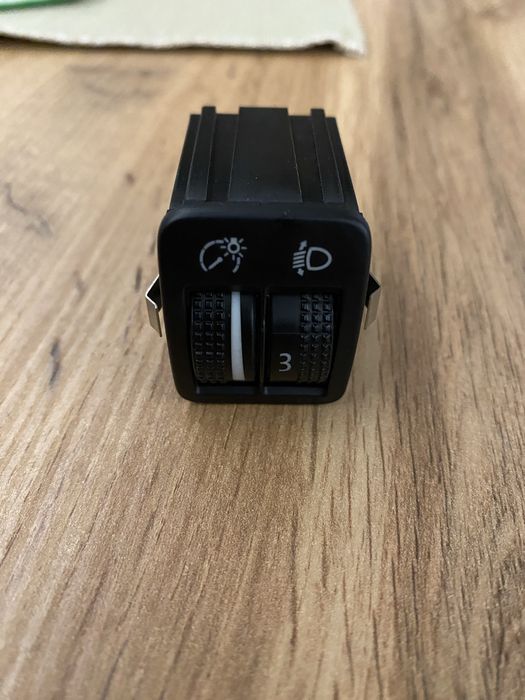 Бутон за регулиране на фарове за VW