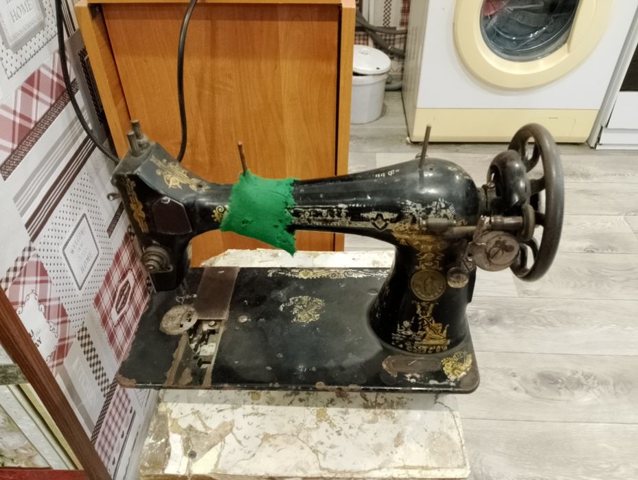 Швейная машинка Зингер