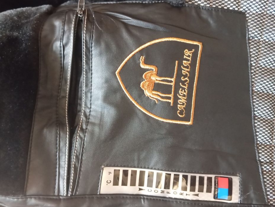 Продам теплую куртку,оригинал