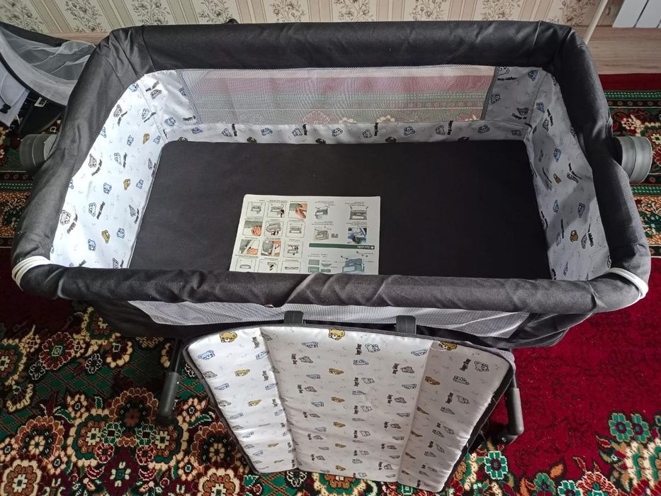 Продам новый манеж-кровать