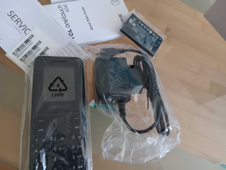 Мобилен телефон TCL onetouch Нов