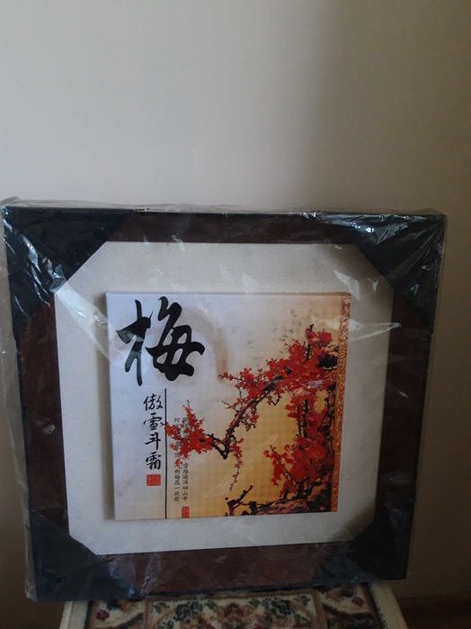 Картина Иероглифы с сакурой в раме