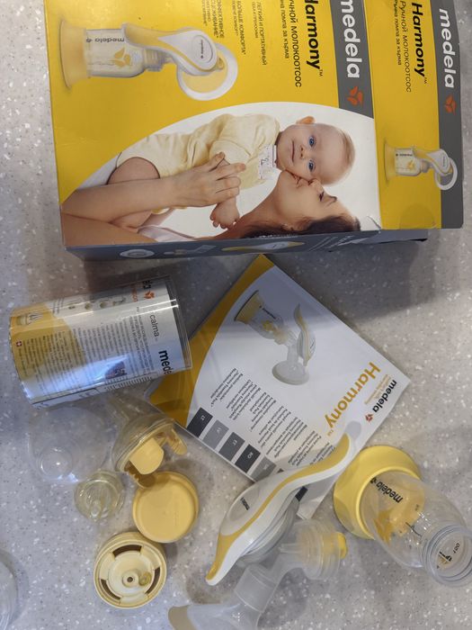 Молокоотсос Medela и соска Medela