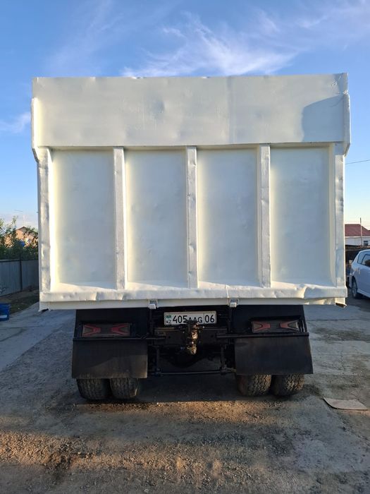 КаМАЗ самосвал белый