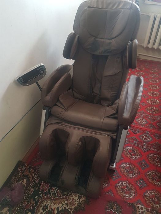 Массажный кресло