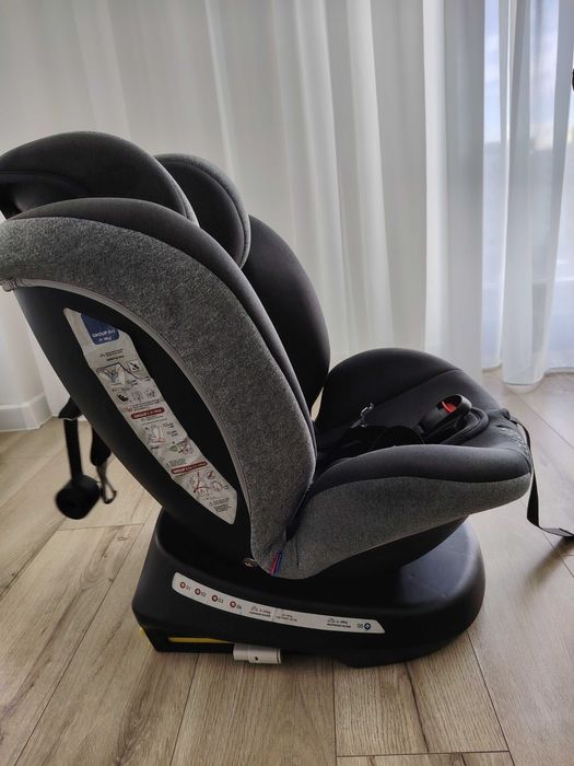 Vând scaun rotativ COCCOLLE cu isofix