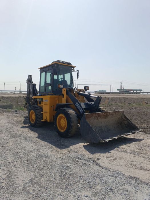 Экскаватор-погрузчик сотилади.