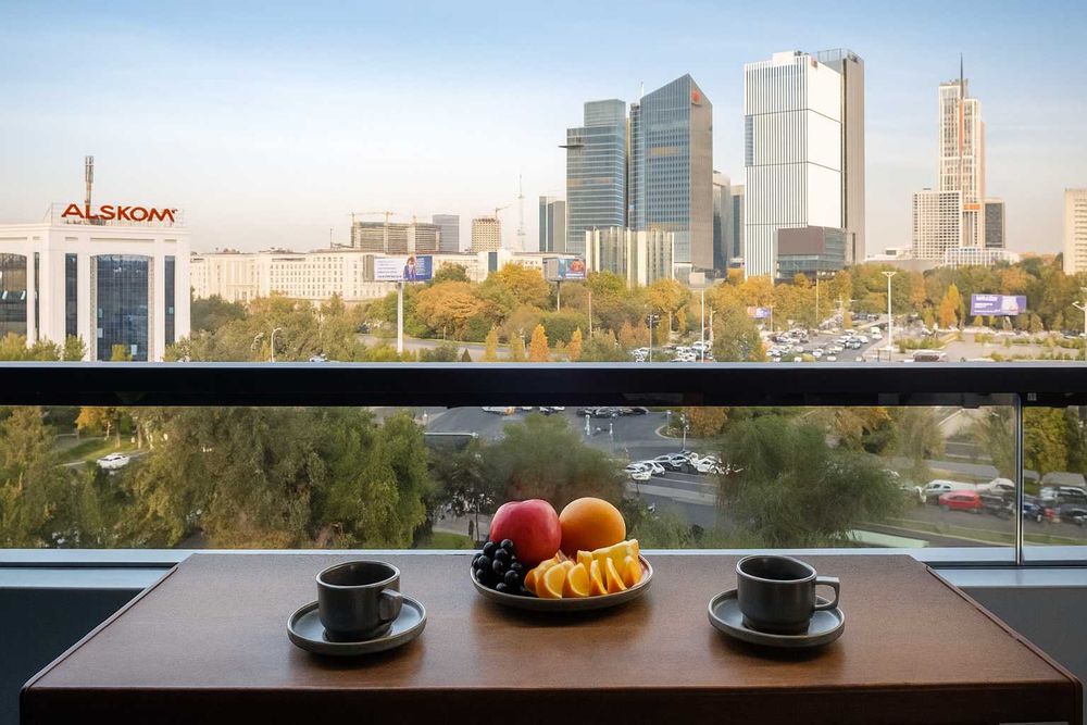 Современная студия с панорамой на Tashkent City посуточно
