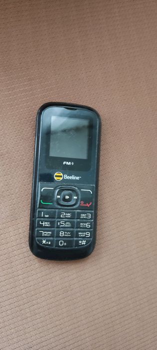 Смартфон Самсунг J1