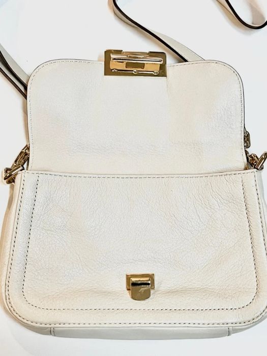 Кожаная сумка  от бренда Michael Kors