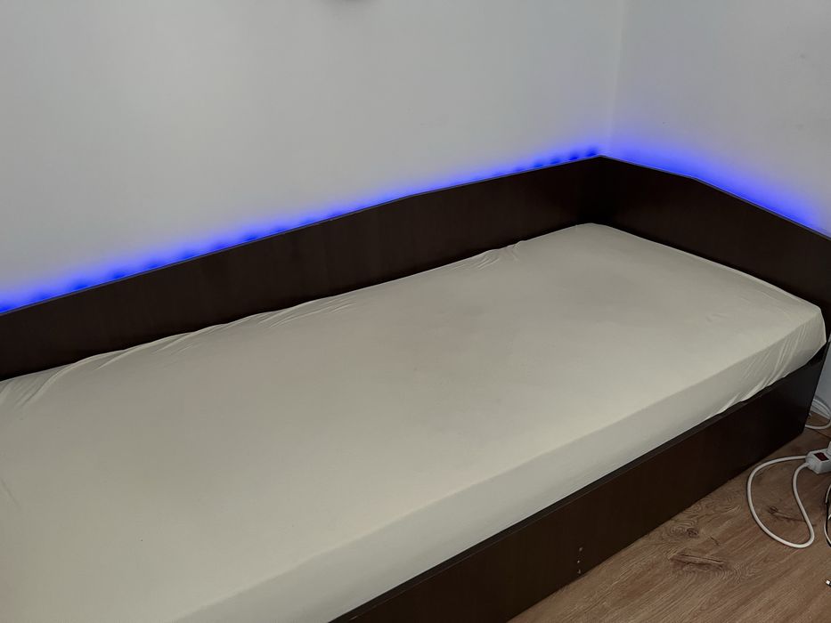 Единично легло с подматрачна рамка с LED лента и нощно шкафче
