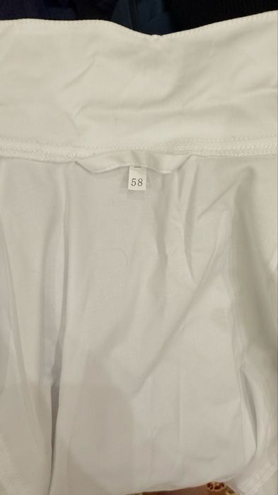 Продам новые белые халаты