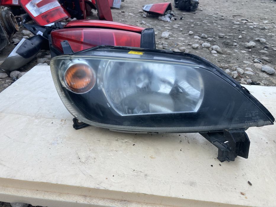 Оригинални фарове за Мазда 2 2002- 2006