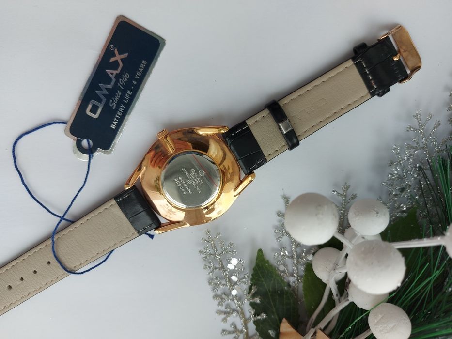 Новые наручные часы. Фирма Omax.