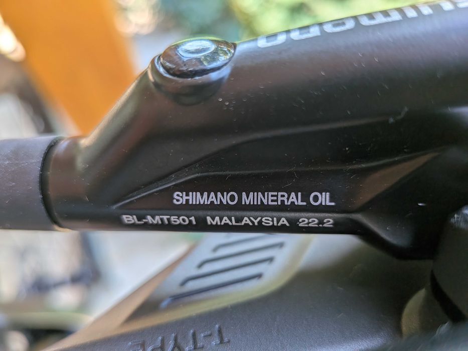 Set frane pentru bicicleta Shimano MT501 cu 2 pistoane hidraulice