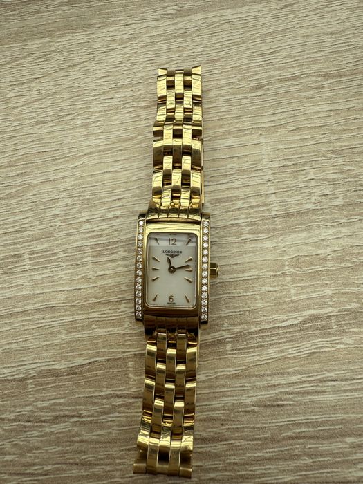 Срочно продам золотые швейцарские брендовы часы Longines.   L