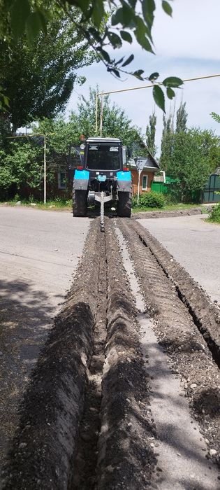 Услуги траншеекопател
