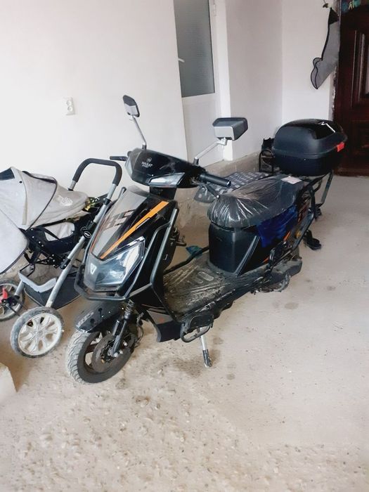 Электрон скутер йанги