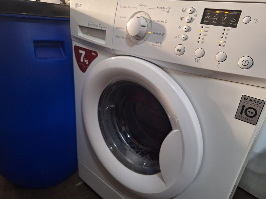 Mașina de spălat haine  la butoi LG 7kg direct drive