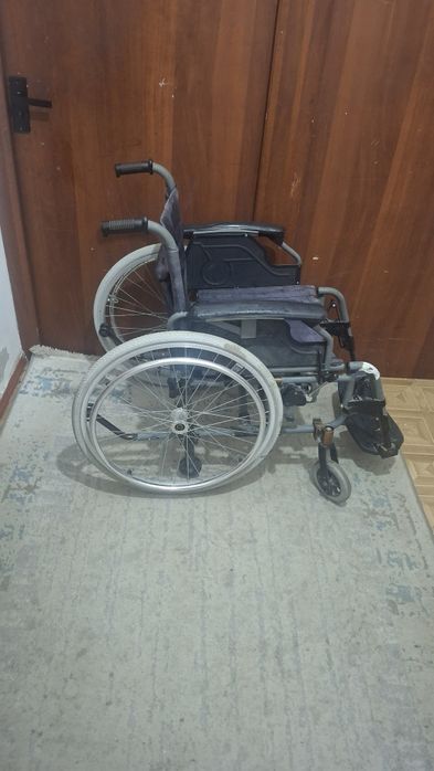 Инвалидная коляска