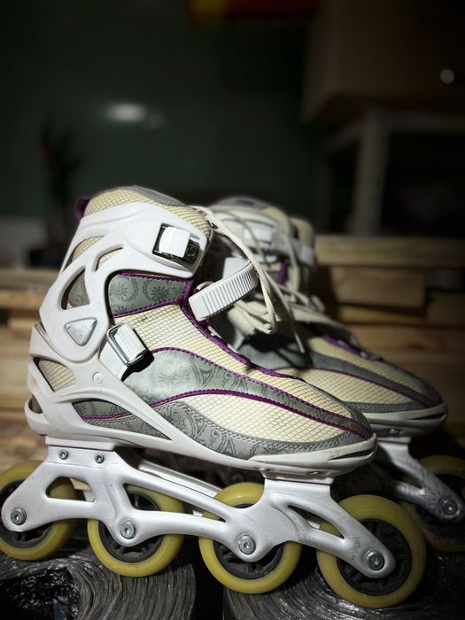 Роликовые коньки
