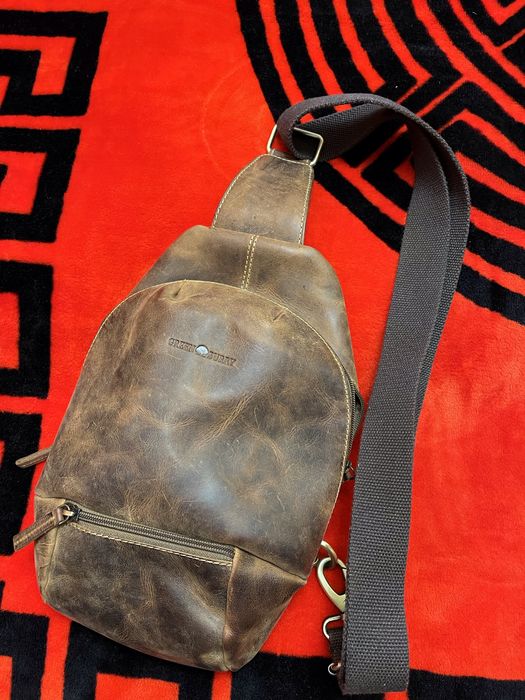 Borsetă piele naturală.