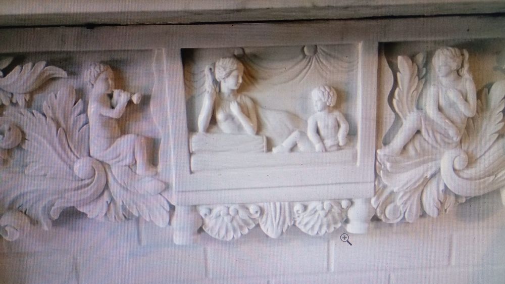 Камин из белого мрамора