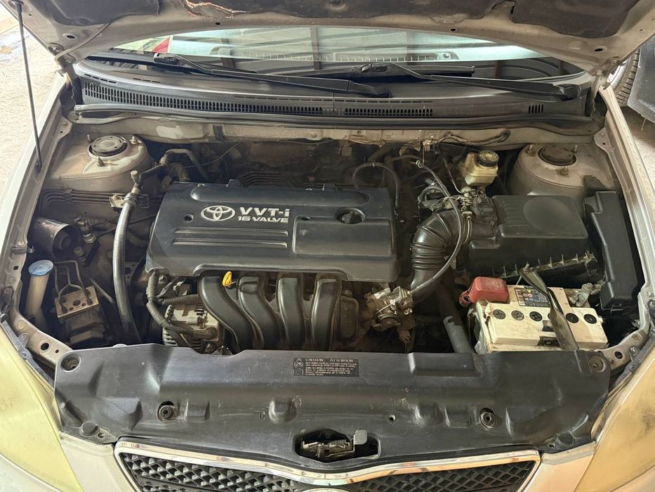 Тойота каролла 2003