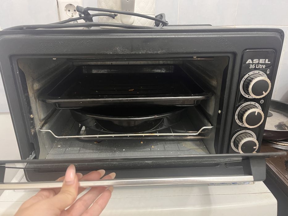 Продам мини духовку 15000