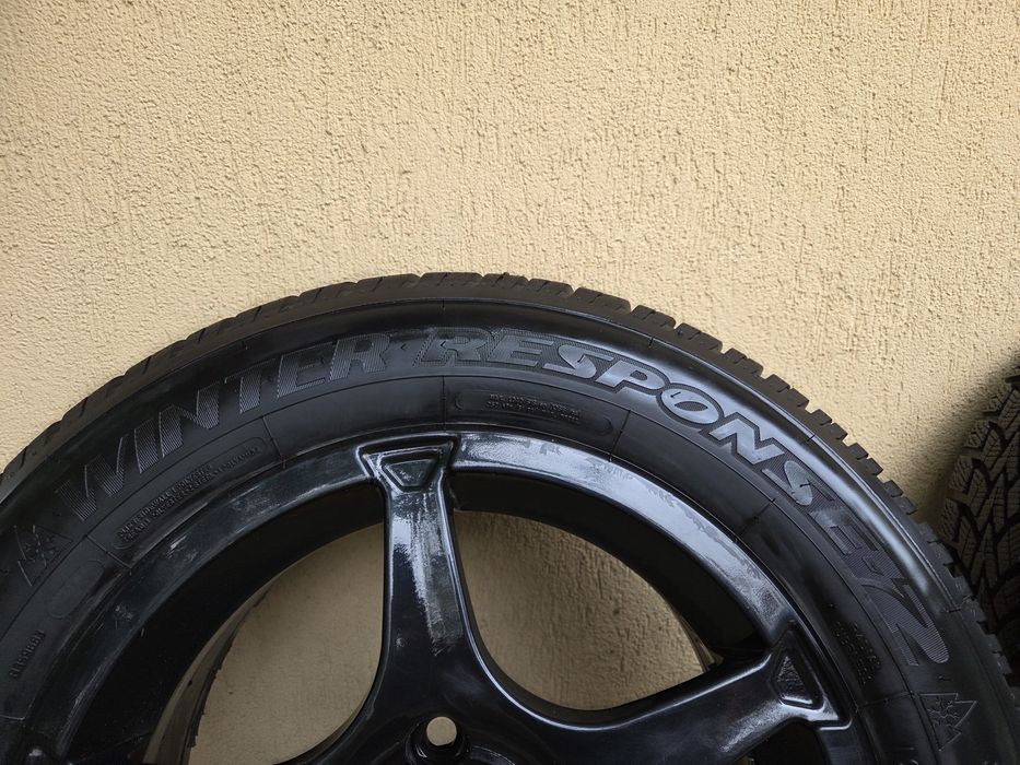Set roți ford iarnă. Jante 5x108 + anvelope  Dunlop  winter response 195 65 15