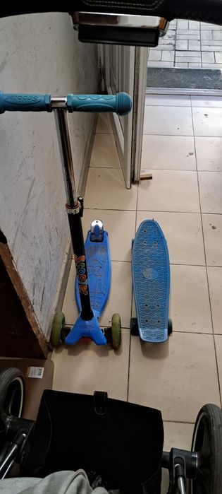 Тротинетка със скейборд