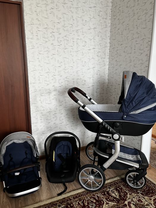 Коляска с автолюлкой